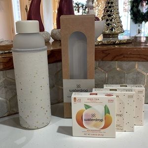 Waterdrop glass bottle, 34 cubes and sleeve